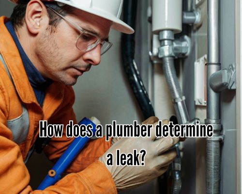 Pipe leak near wall under active repair.